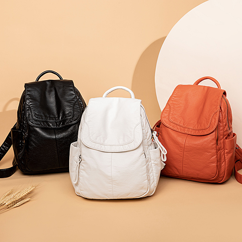 حقيبة ظهر من الجلد الأبيض المغ - مراجعة Travel Accessories Leather وسعره