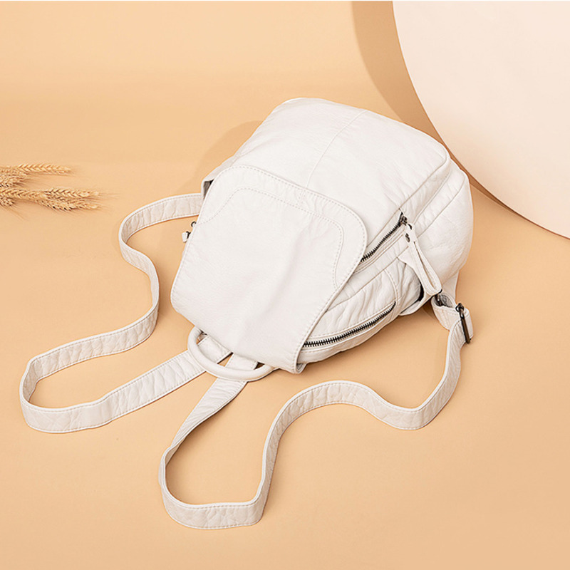 حقيبة ظهر من الجلد الأبيض المغ - مراجعة Travel Accessories Leather وسعره